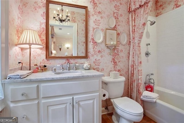 full bathroom with vanity, tile patterned flooring, toilet, a chandelier, and shower / bathtub combination with curtain