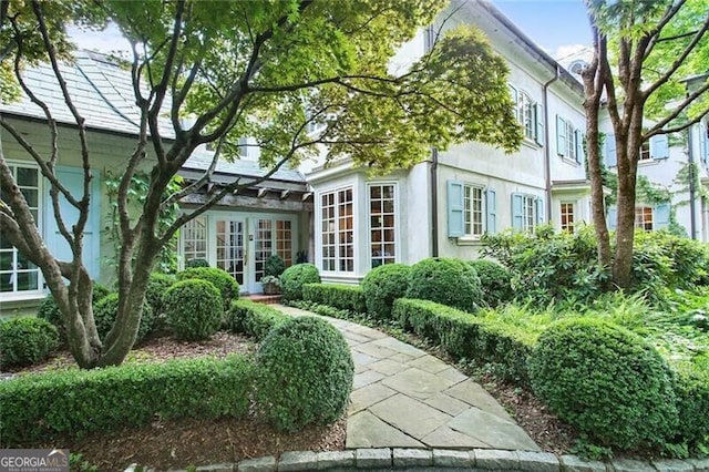 view of front facade featuring french doors