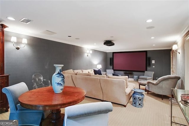 cinema room featuring ornamental molding