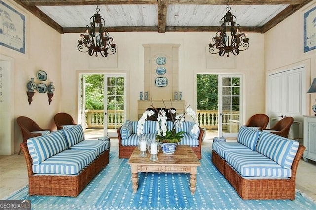 living area with an inviting chandelier, wooden ceiling, and beam ceiling