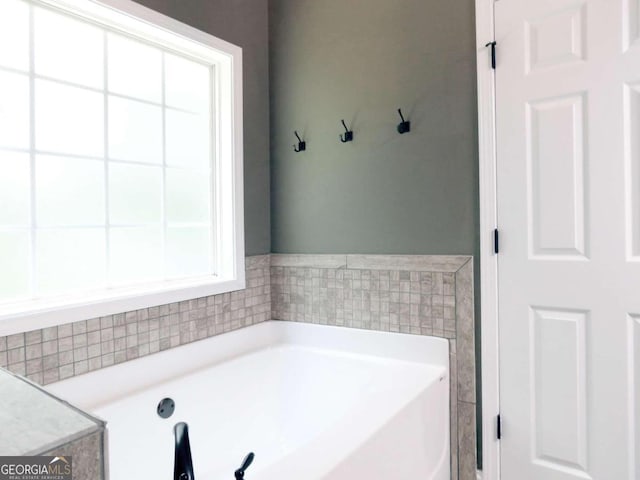 bathroom featuring a bathing tub