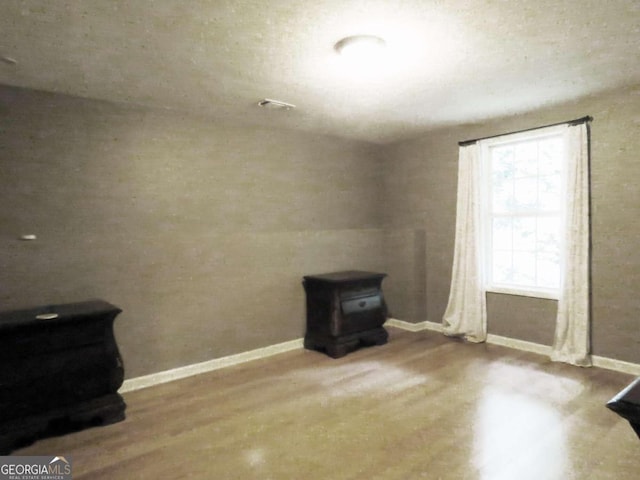 interior space with hardwood / wood-style flooring