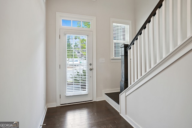 doorway featuring dark hardwood / wood-style flooring