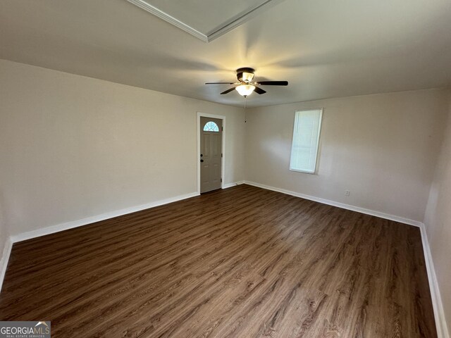 unfurnished room featuring ceiling fan and wood-type flooring