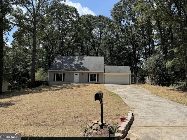 view of front of house with driveway and an attached garage