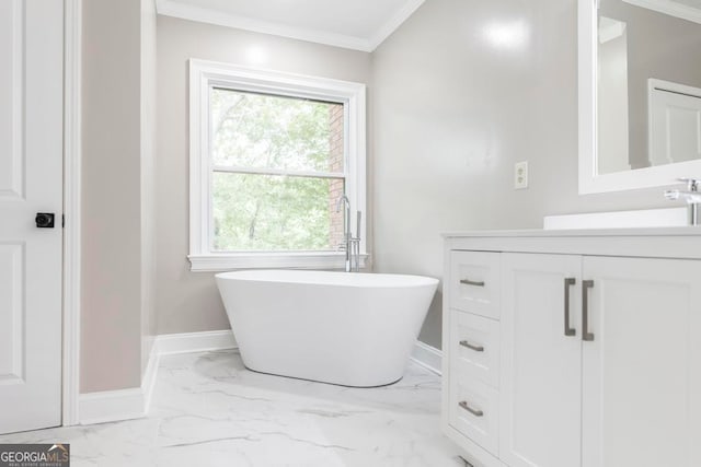 bathroom with a tub to relax in, vanity, and crown molding