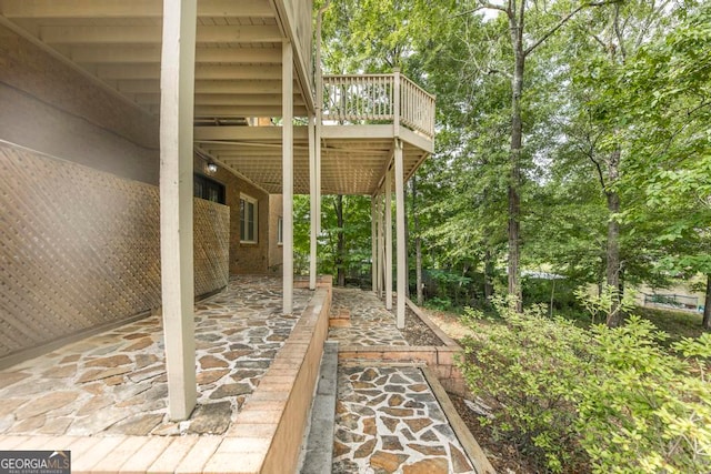 view of patio featuring a wooden deck