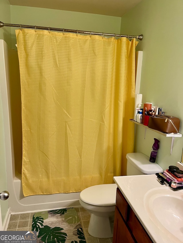 full bathroom featuring vanity, toilet, tile patterned flooring, and shower with separate bathtub