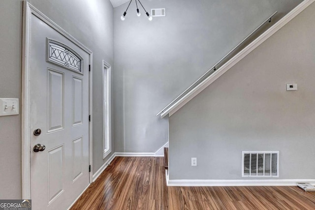 foyer featuring dark hardwood / wood-style floors