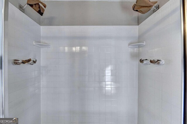 room details with a tile shower