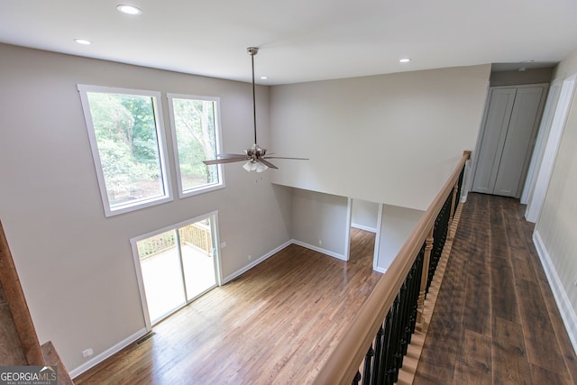 corridor with dark wood-type flooring