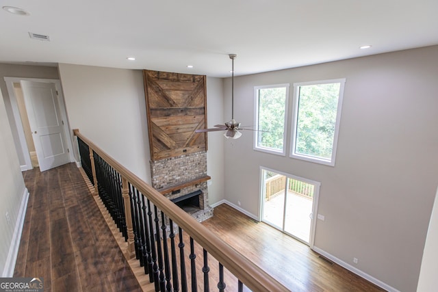 hallway with dark hardwood / wood-style floors