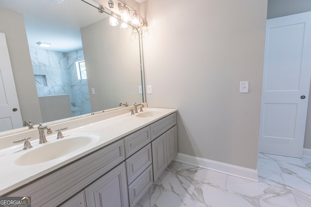 bathroom featuring vanity and a tile shower