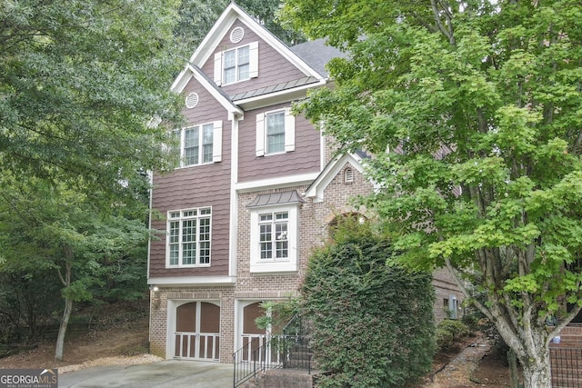 view of front of home with a garage