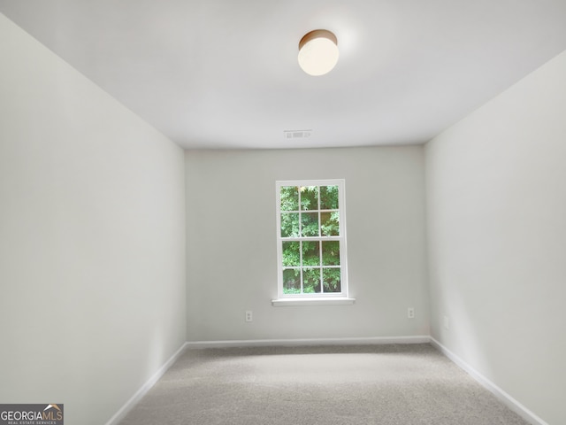 empty room featuring carpet floors