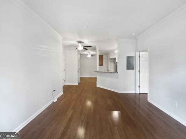 unfurnished living room featuring crown molding, dark wood-type flooring, electric panel, and ceiling fan