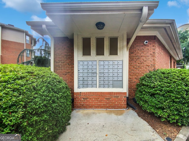 200 Renaissance Pkwy NE Apt 302, Atlanta, GA 30308 - entrance to property featuring brick siding and a security system