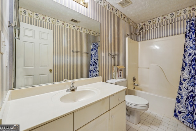 full bathroom with toilet, tile patterned flooring, vanity, a textured ceiling, and shower / bath combo