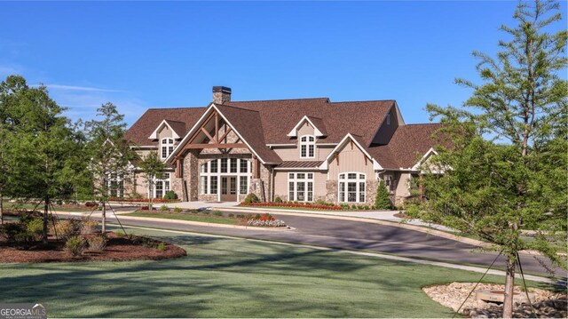 exterior space featuring a front lawn