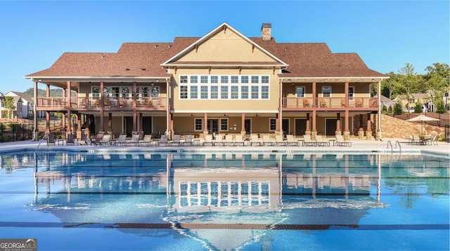 view of swimming pool featuring a patio area