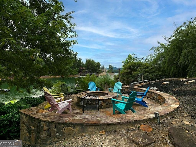 view of patio featuring a fire pit