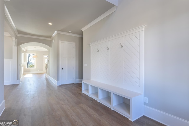 mudroom with hardwood / wood-style flooring and crown molding