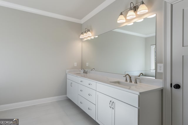 bathroom with ornamental molding and vanity