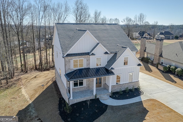 modern inspired farmhouse with covered porch