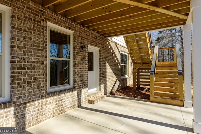 property entrance with a patio