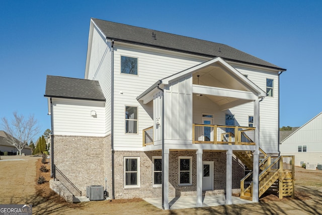 back of property featuring a patio and central AC