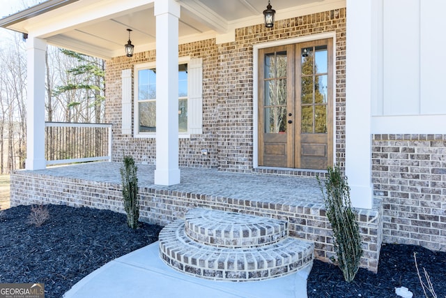 doorway to property featuring french doors