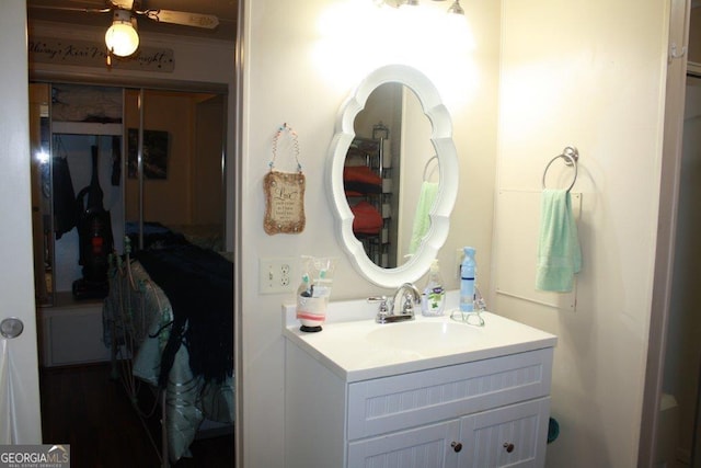 bathroom featuring vanity and ceiling fan