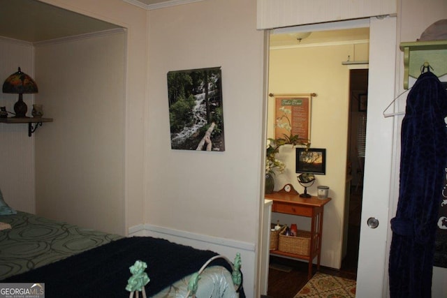 bedroom with ornamental molding