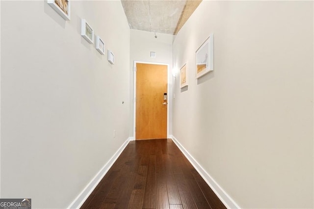 corridor featuring hardwood / wood-style flooring