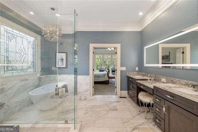 bathroom with independent shower and bath, ornamental molding, and vanity