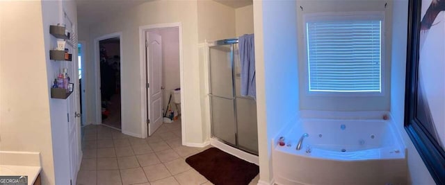 bathroom featuring independent shower and bath and tile patterned floors