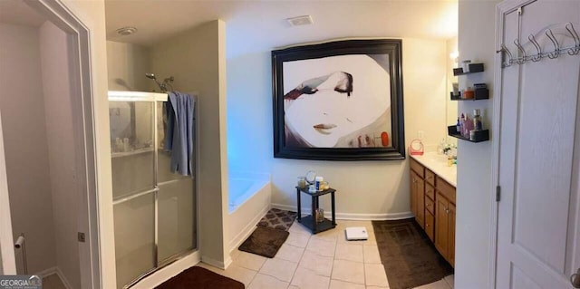 bathroom with vanity, separate shower and tub, and tile patterned floors