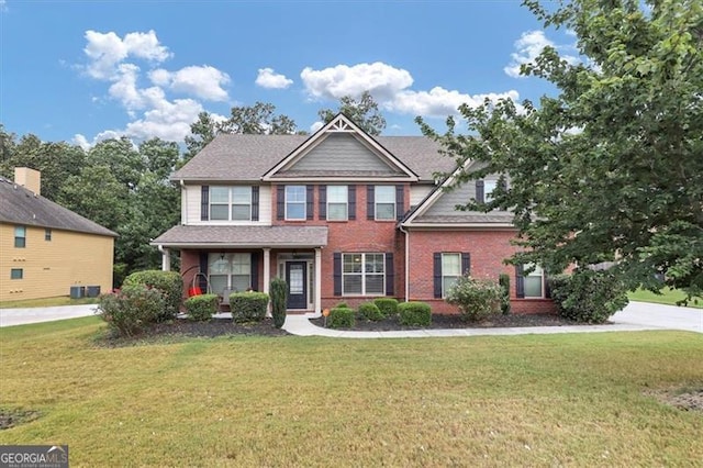 view of front of property with a front lawn