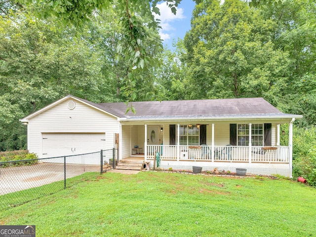 single story home with a front yard and covered porch