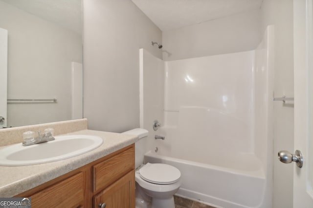 full bathroom with vanity, toilet, and shower / tub combination