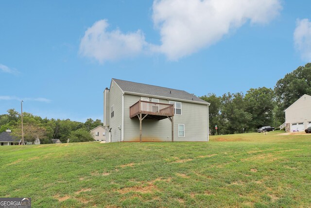 view of outbuilding with a lawn