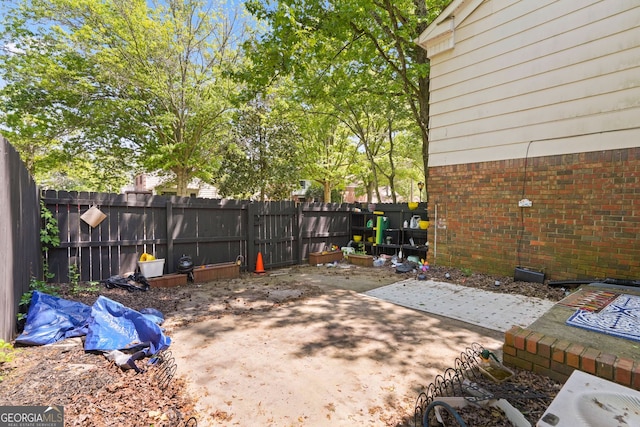 6584 Sleepy Hollow Ln, Morrow, GA 30260 - fenced backyard with a patio
