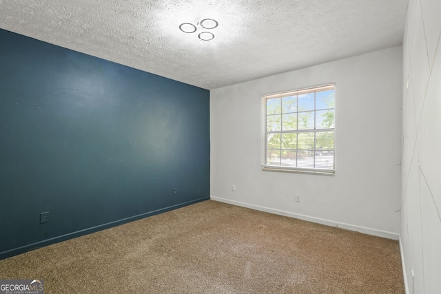 6584 Sleepy Hollow Ln, Morrow, GA 30260 - unfurnished bedroom featuring carpet floors, a textured ceiling, a closet, and baseboards