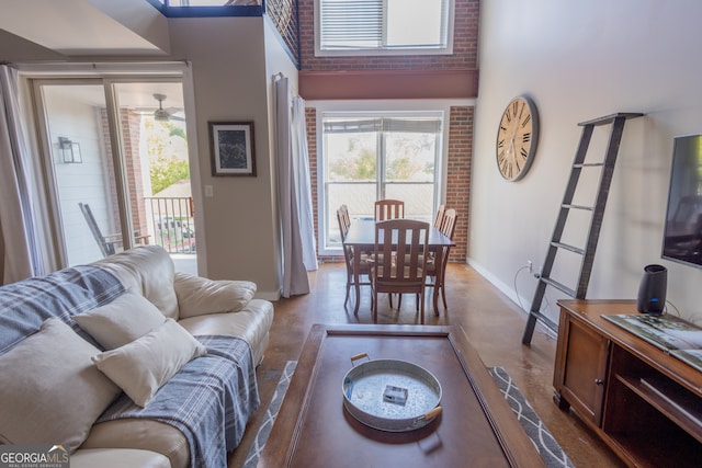 living room featuring concrete flooring