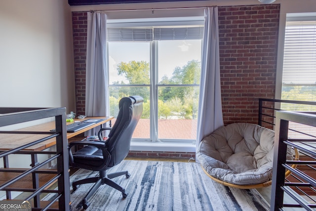 office featuring a wealth of natural light and hardwood / wood-style floors