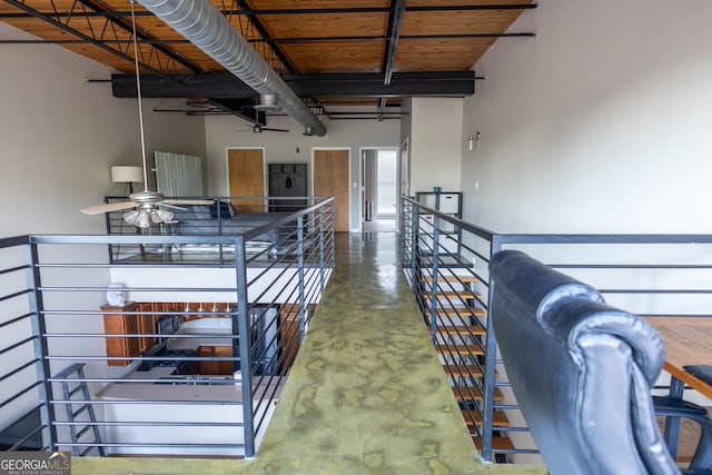 interior space featuring ceiling fan