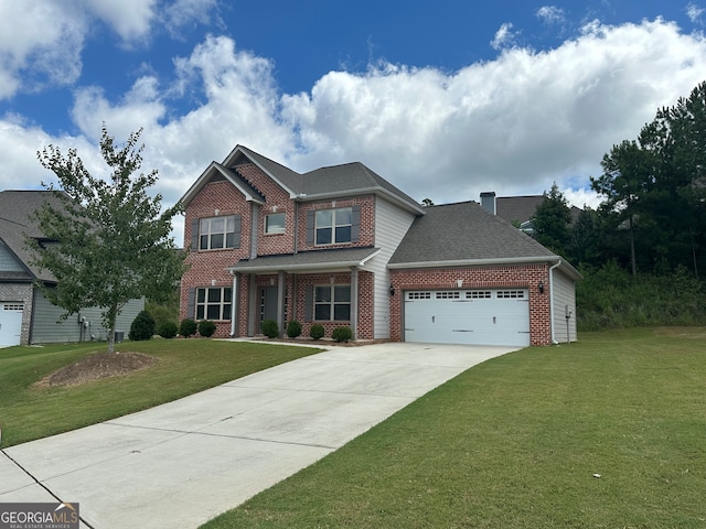 view of front of home featuring a garage and a front lawn