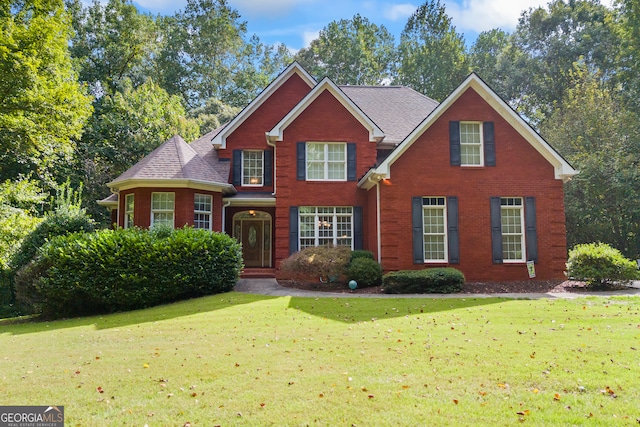 view of property with a front lawn