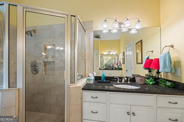 bathroom featuring vanity and walk in shower