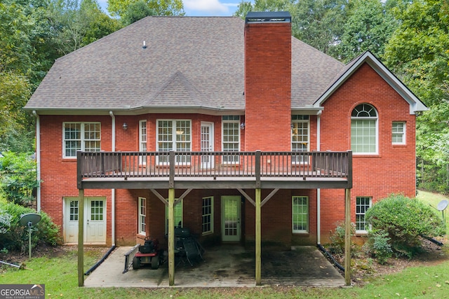 rear view of property with a patio area